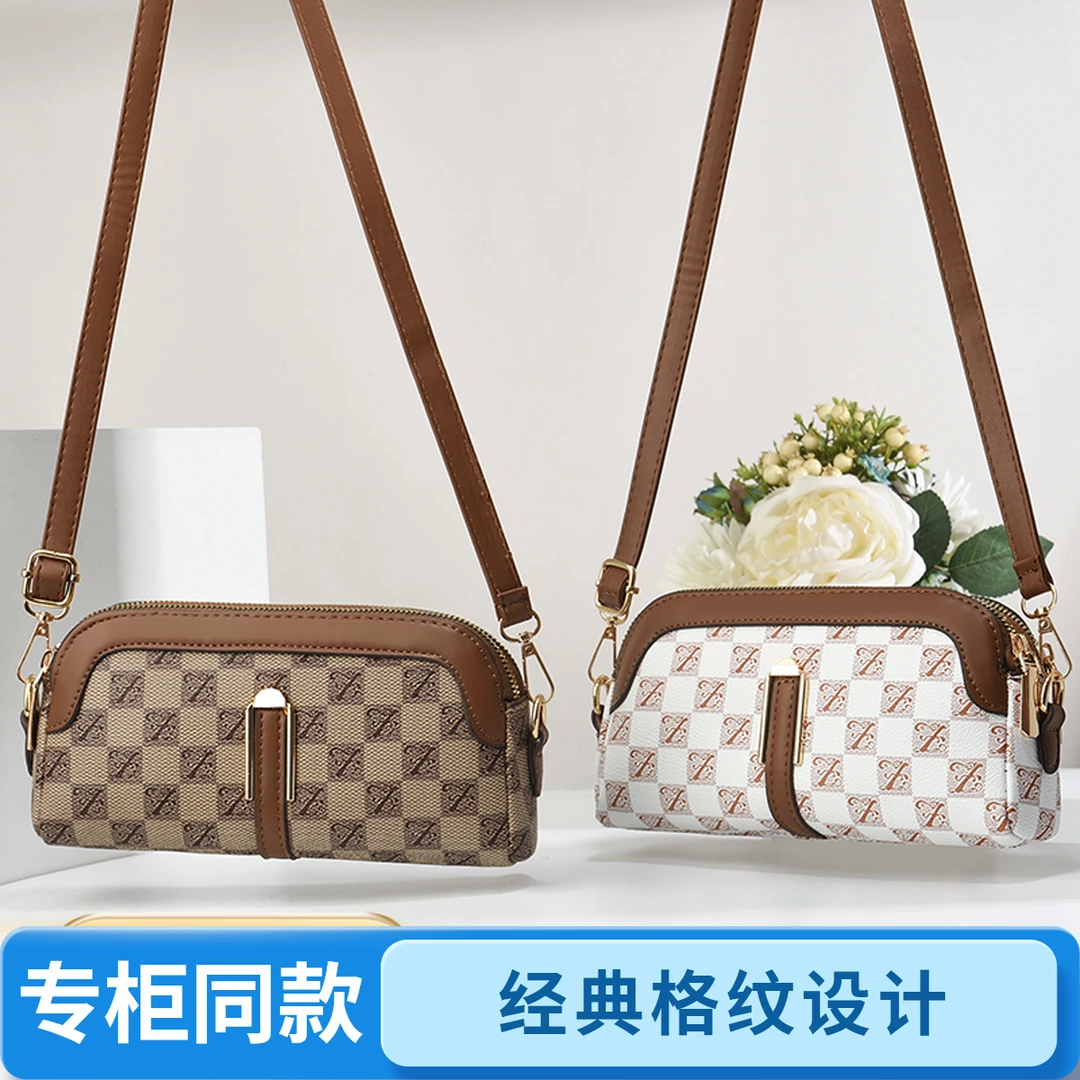 真皮质感2025新款百搭印花手机包多隔层小包包手拿包单肩斜挎包