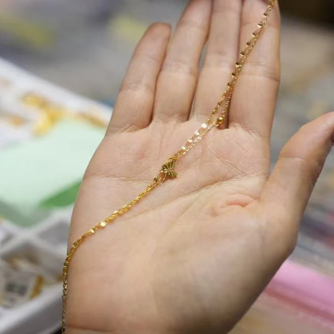 【巧玲专属】足金999鱼唇蝴蝶金珠手链 经典时尚百搭 2.02