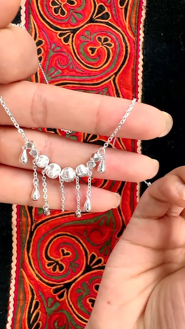 珐琅坠链均足银猫眼珠水滴流苏项链