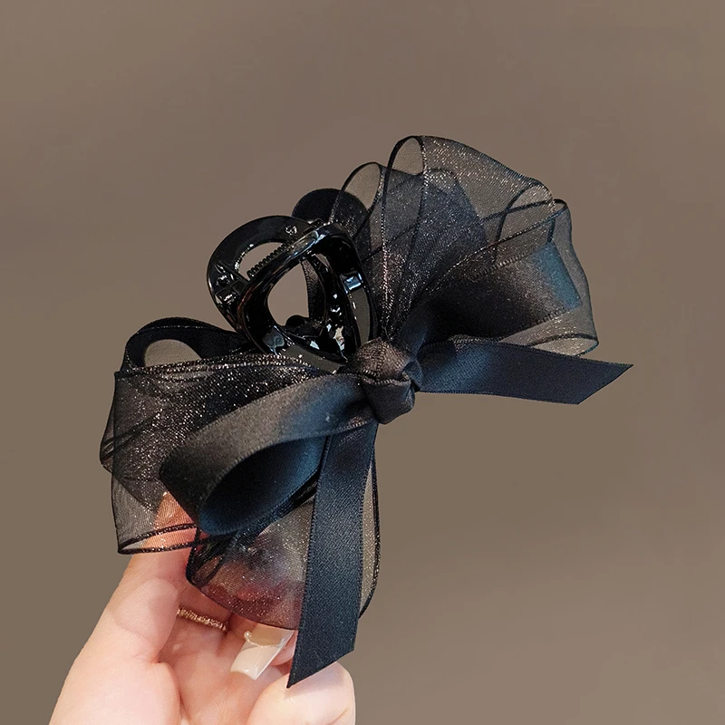 黑色网纱蝴蝶结网红抓夹侧边盘发夹子新款头饰气质后脑勺鲨鱼夹女