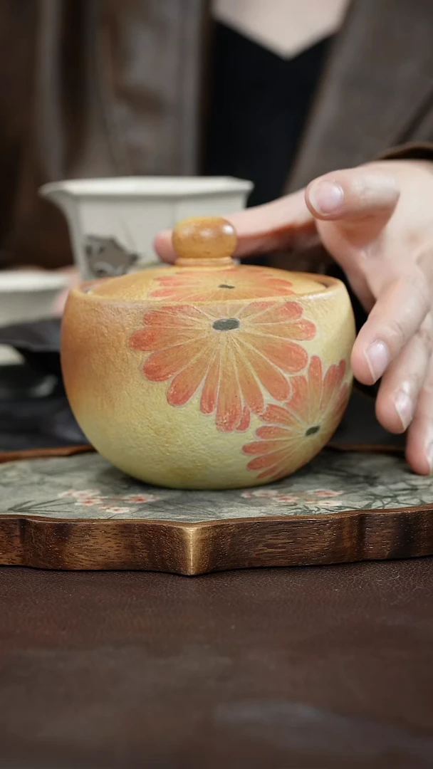 九隐茶器柴烧泥绘太阳花茶叶罐