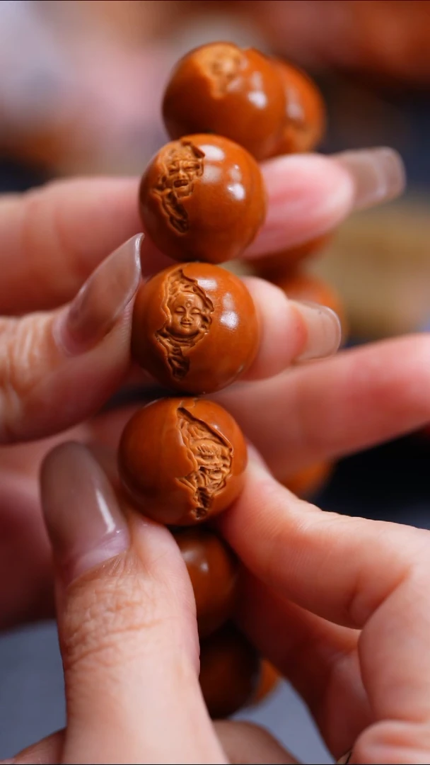 橄榄核手串T****马橄榄核核雕闪购