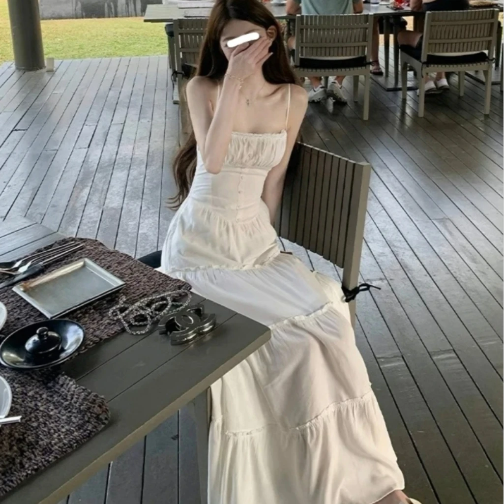 白色初恋吊带裙夏季新款法式度假连衣裙仙女收腰显瘦裙子气质长裙