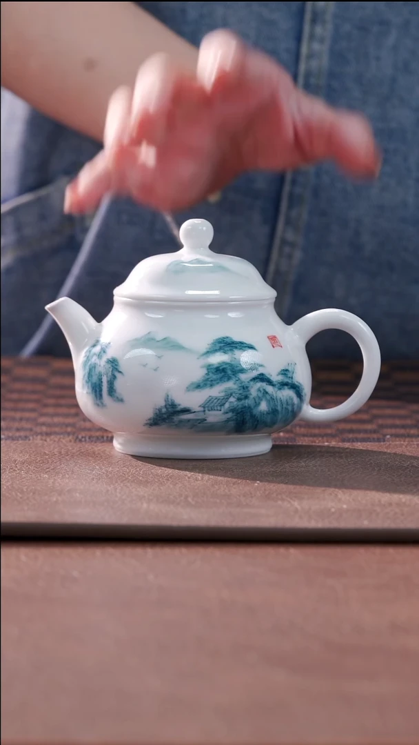 柴烧白瓷山水潘壶