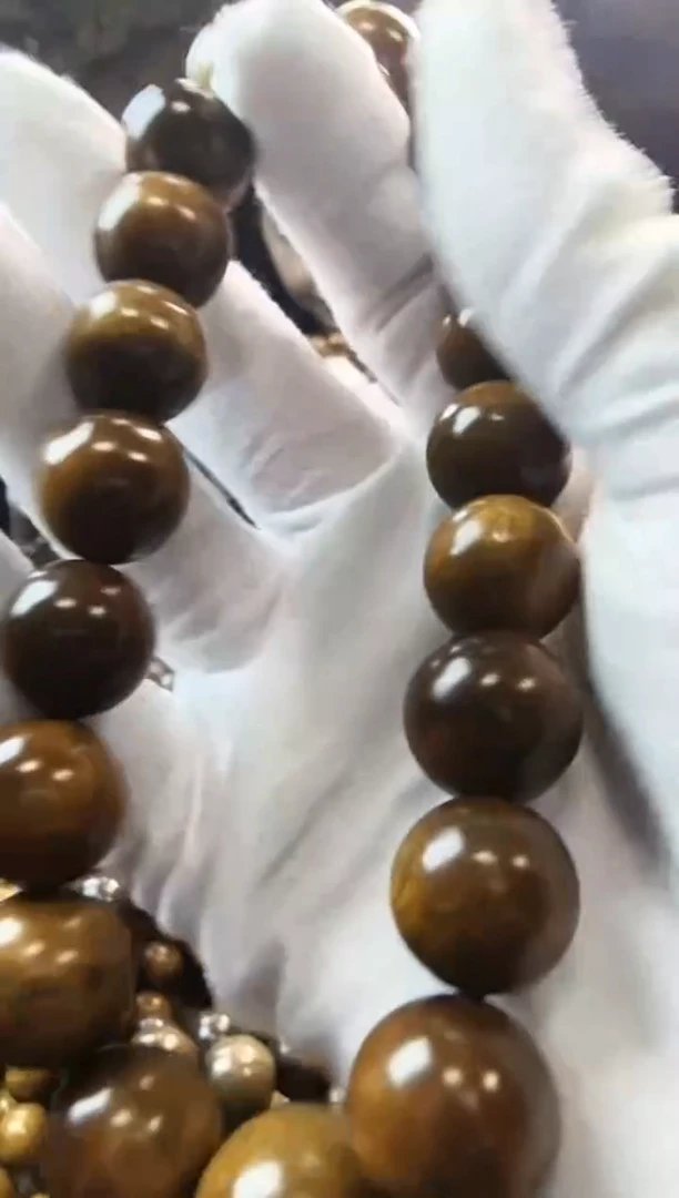 金丝楠1.5阴沉黄手持手把件