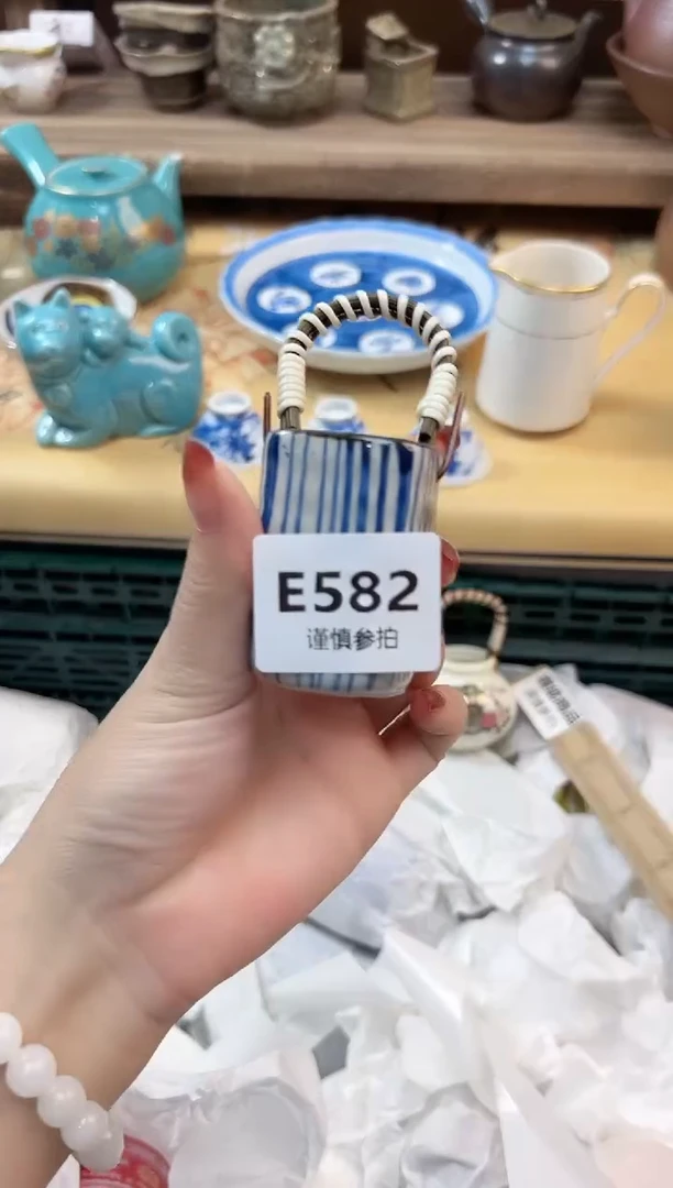 瓷片?**F   582