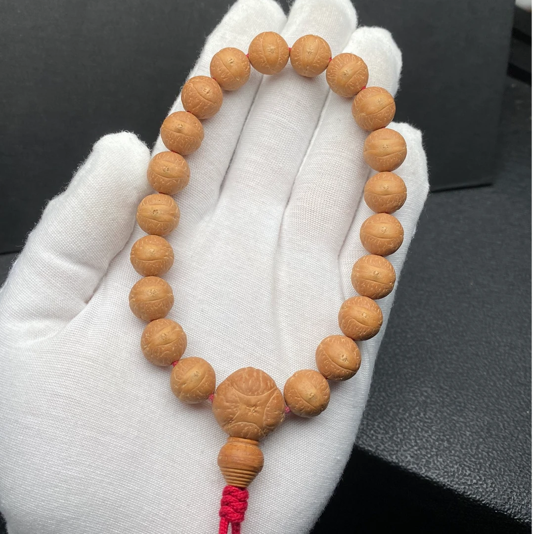 尼泊尔实心籽11.5mm大眼睛小凤眼菩提手串