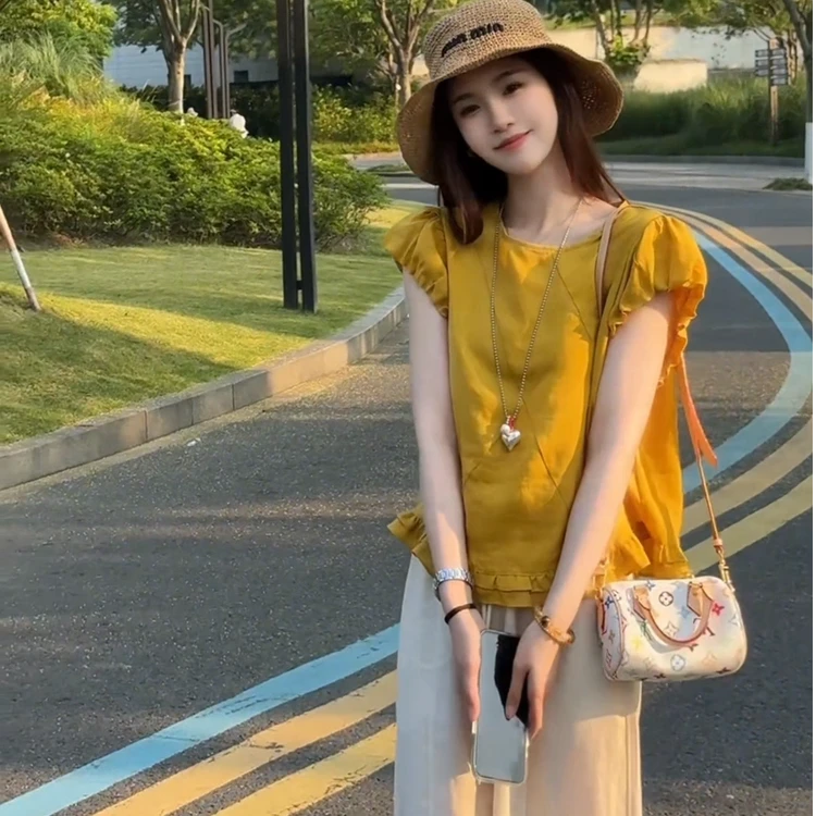 WEWE时尚法式气质设计下摆荷叶衬衫2025夏季新款显瘦圆领短袖上衣