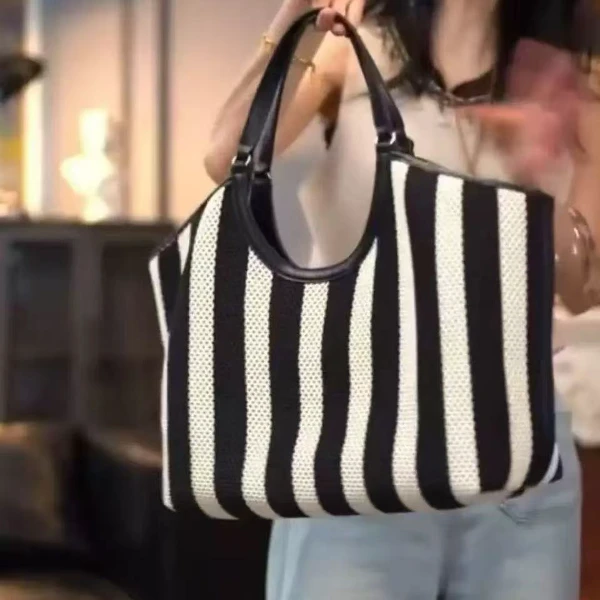 菜篮子编织包包女2025新款潮休闲度假慵懒风单肩腋下托特包通勤包