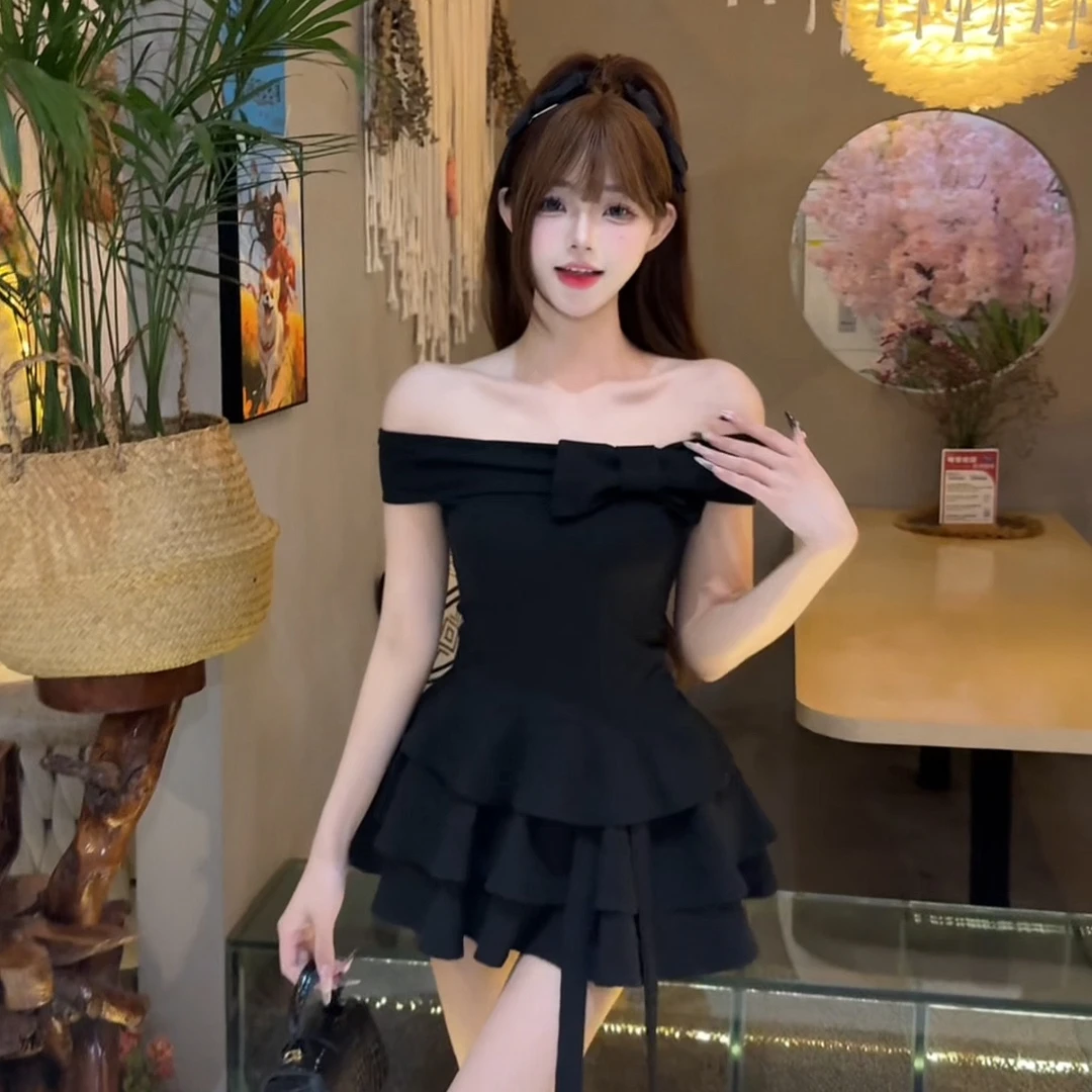 夏季新款时尚气质纯欲甜辣风一字肩上衣收腰显瘦短裙子两件套2519
