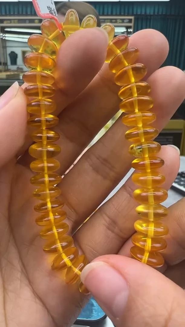 未镶嵌琥珀手链3秒拍号假一罚十