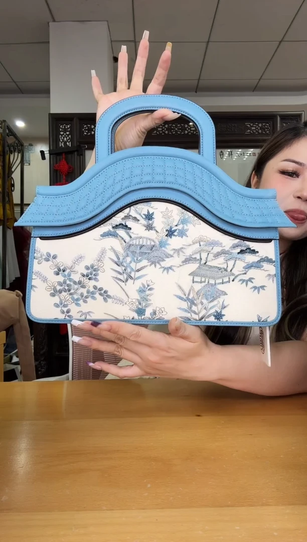 织物粉***花手提房子包