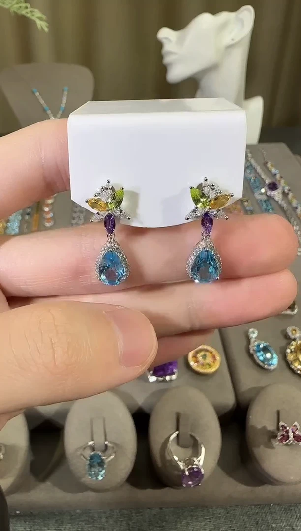 银S925镶嵌托帕石耳饰10*8mm妖姬蓝耳坠设计款