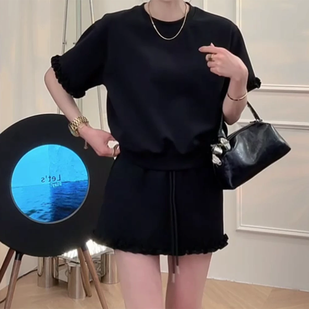 2025夏季时尚新款时尚木耳边韩版减龄短袖T恤+防走光短裙两件套