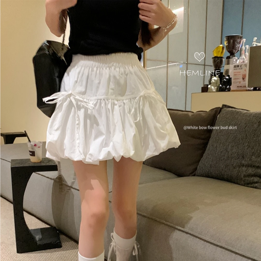 夏季新款白色甜美风A字短裙花苞裙女高级设计感蝴蝶结蓬蓬半身裙