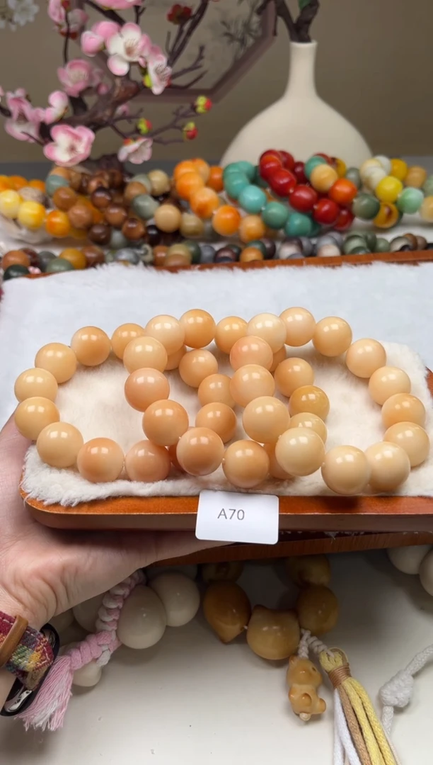 菩提根/象牙果吊坠瑕A70圆珠16-17mm一串随机