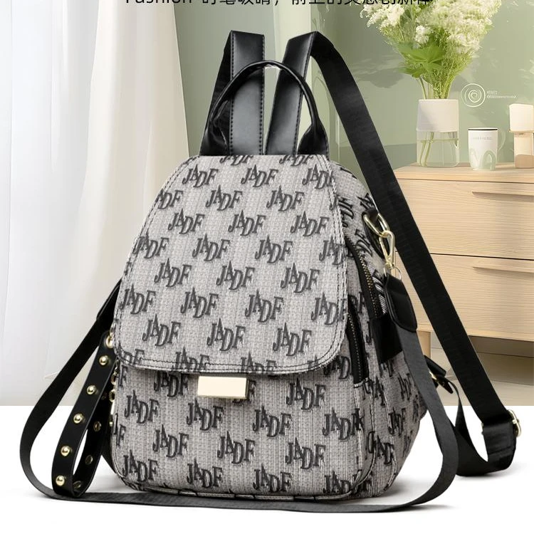 【宠粉专属】2069休闲斜字母多功能百搭盖式新款轻便旅行洋气双肩包