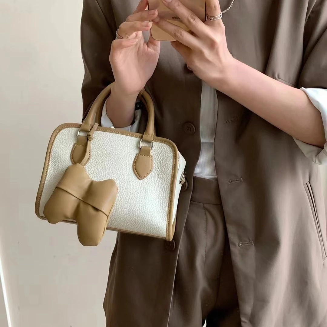 【芝麻集】J-6208-白色/奶茶RAIN.CUN时尚休闲百搭腋下斜跨女包