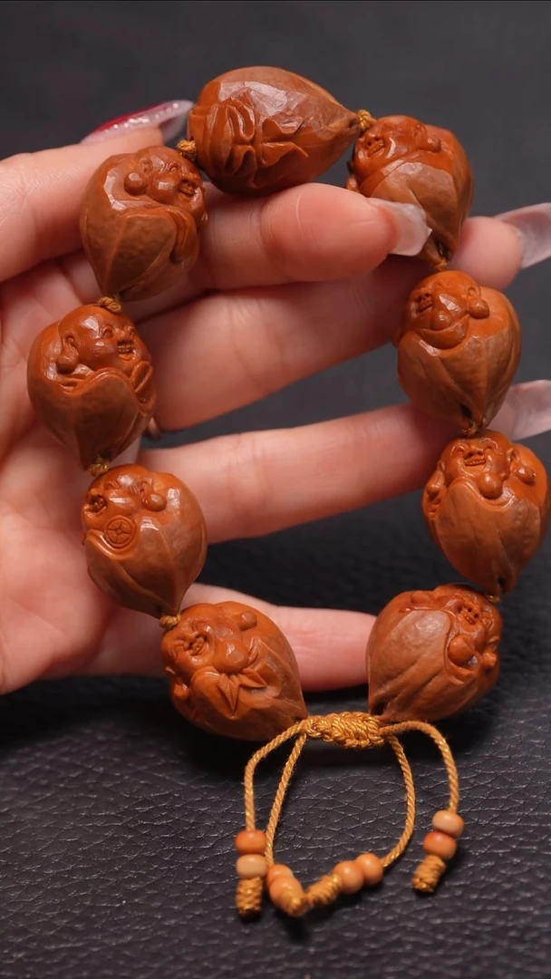 手串橄榄核2.1/铁核包衣弥勒