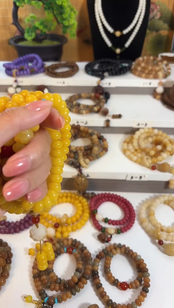 手串菩提根/象牙果8*11帝黄108颗