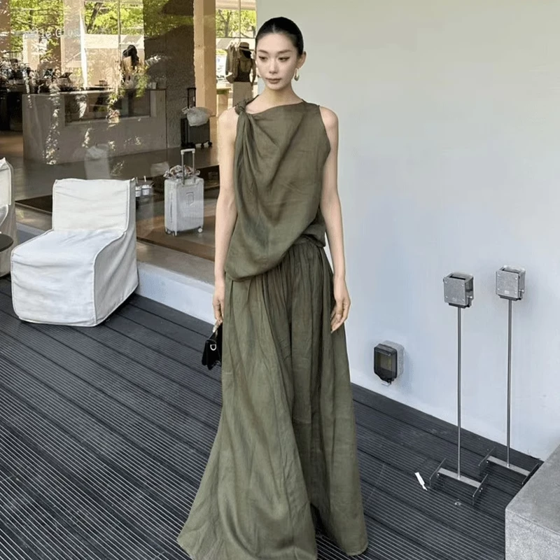 夏2025法式穿搭轻奢高级感小香风套装女绿色无袖上衣半身裙两件套