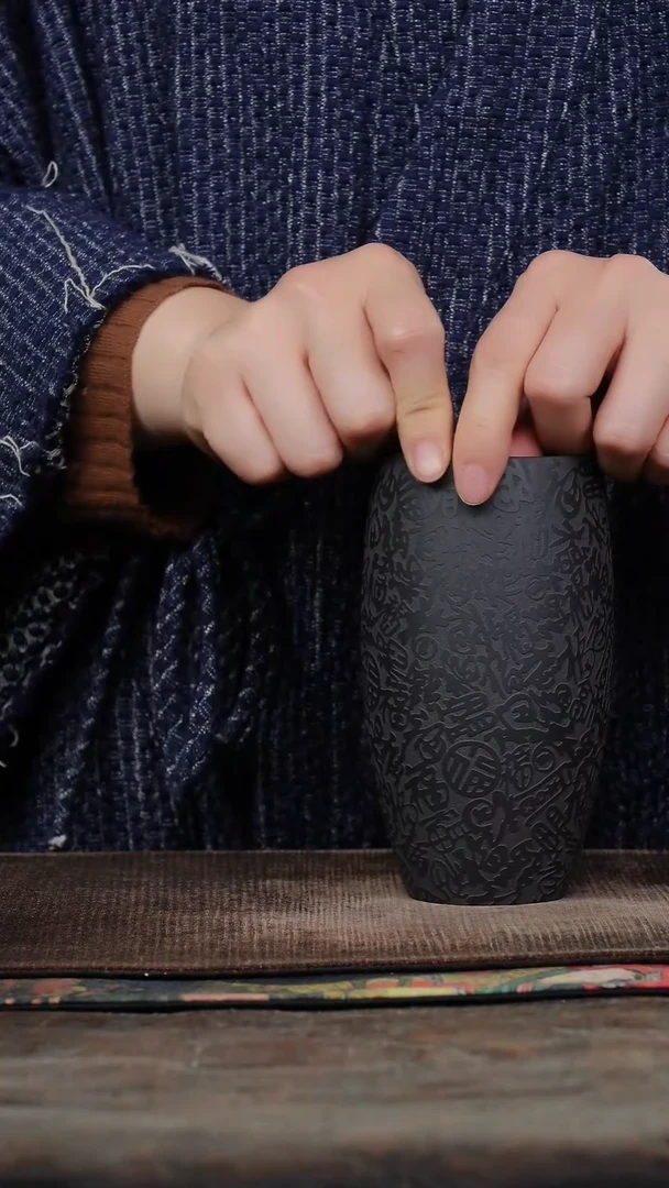 石黄刻绘百福高身紫砂杯