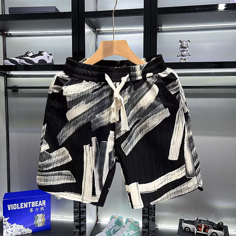 潮牌休闲短裤男士夏季2025新款外穿宽松痞帅印花沙滩五分裤子男款