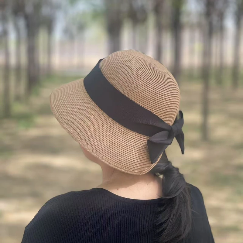 赫本风优雅蝴蝶结遮阳草帽女韩版大帽檐出游防晒渔夫帽女可折叠