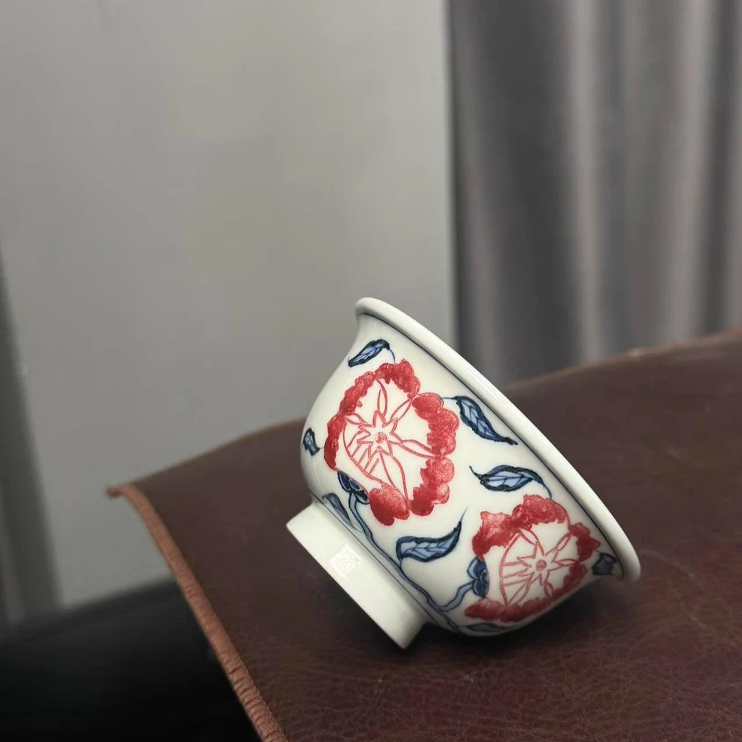 有瑕疵釉里红花压手杯