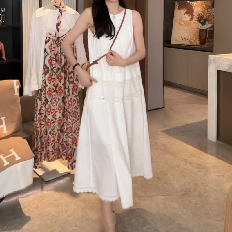 【初心】2025春夏新款百搭法式轻奢镂空绣花设计感连衣裙LK2502453