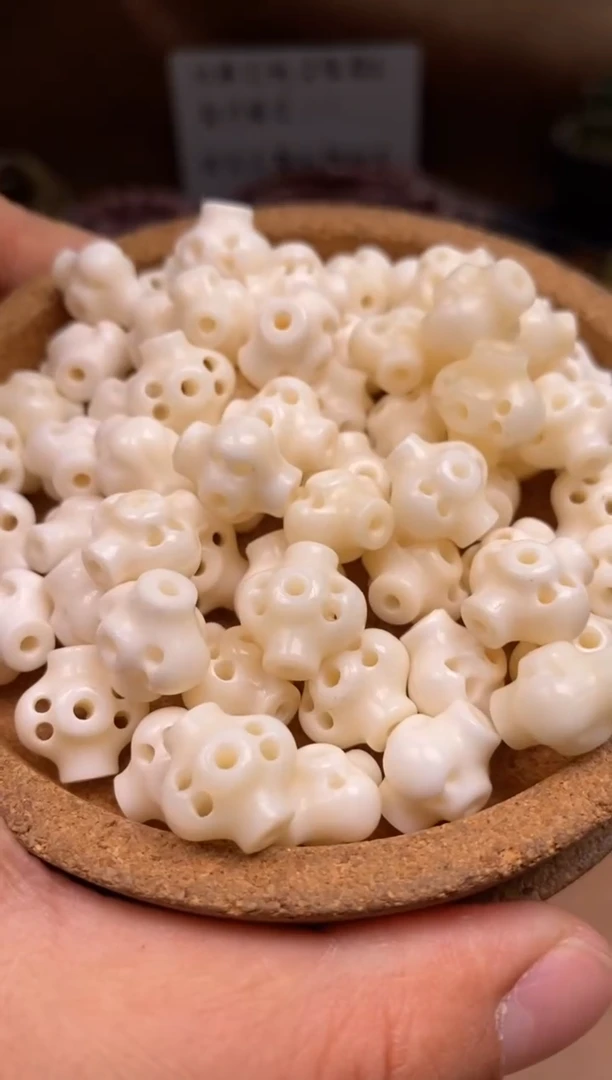 其他牛骨P1255-五眼六通2个-有棕裂