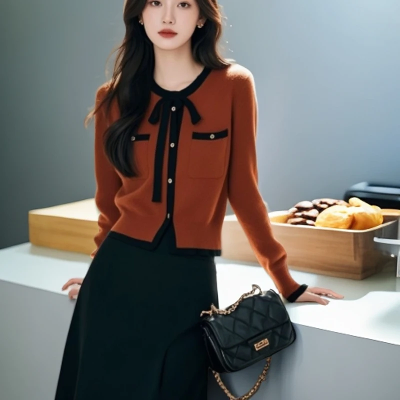 [工厂直销套装]早秋小香风蝴蝶结针织衫搭配高腰半身裙X150+Q179