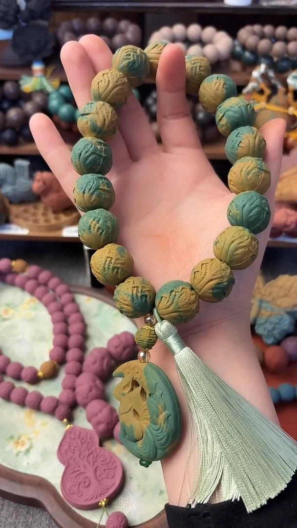 泥塑柚见清茶百财手持一条