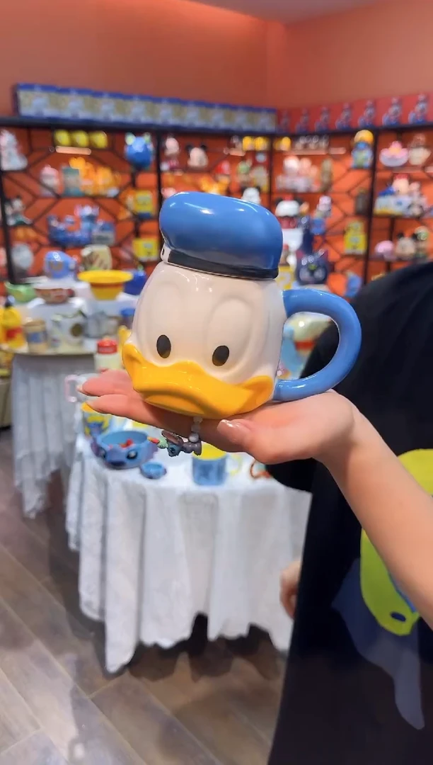 瓷片@@唐老鸭带盖陶瓷杯