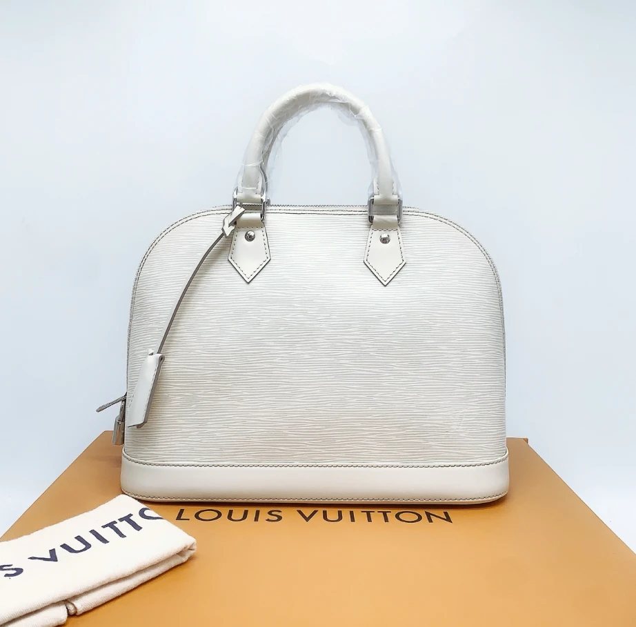 95新 LouisVuitton/路易威登 白色水波纹贝壳包C21929 7684