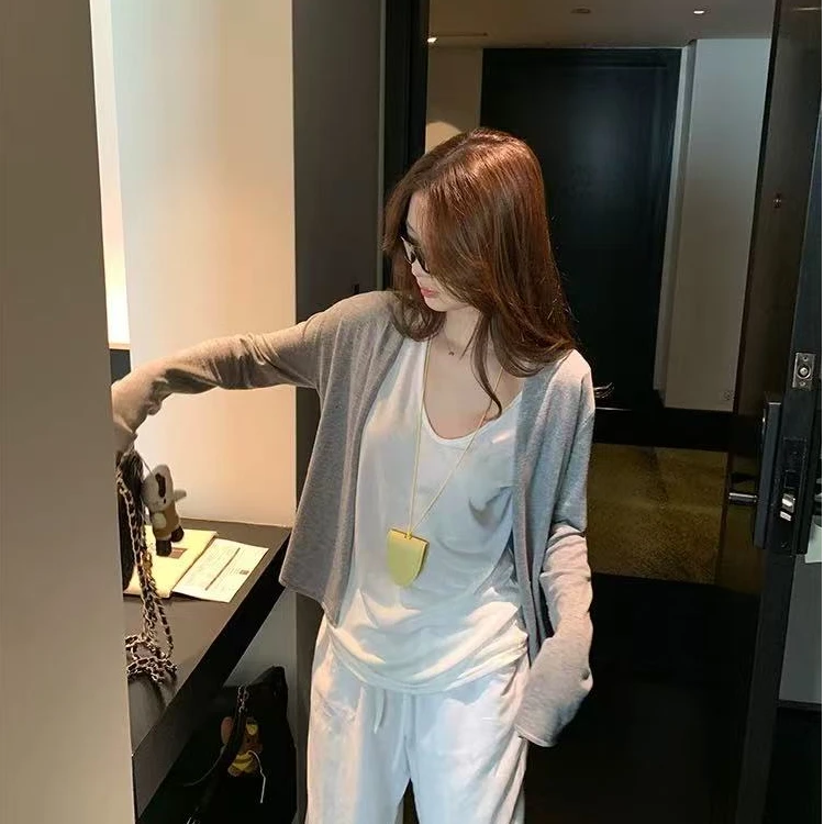 25315夏日氧气感 博主都在穿得慵懒吊带防晒开衫套装