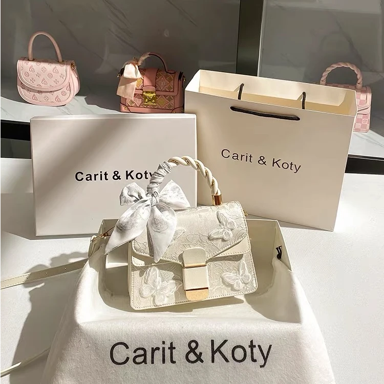 Carit Koty高级感编织手提包包女2025新款蝴蝶蕾丝刺绣小方包斜挎
