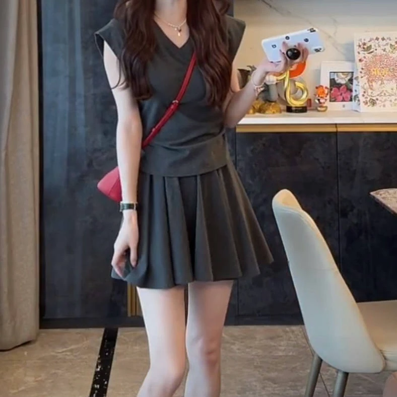 夏季坎肩收腰上衣+A字松紧腰短裙两件套2025新款百搭时尚修身显瘦