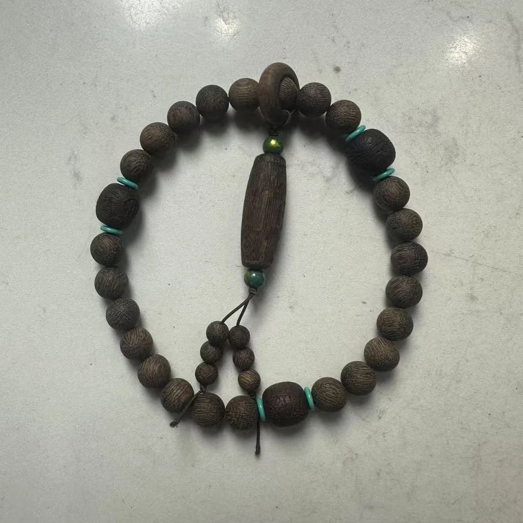 Q11 黑肉老山檀1.2cm圆珠手持