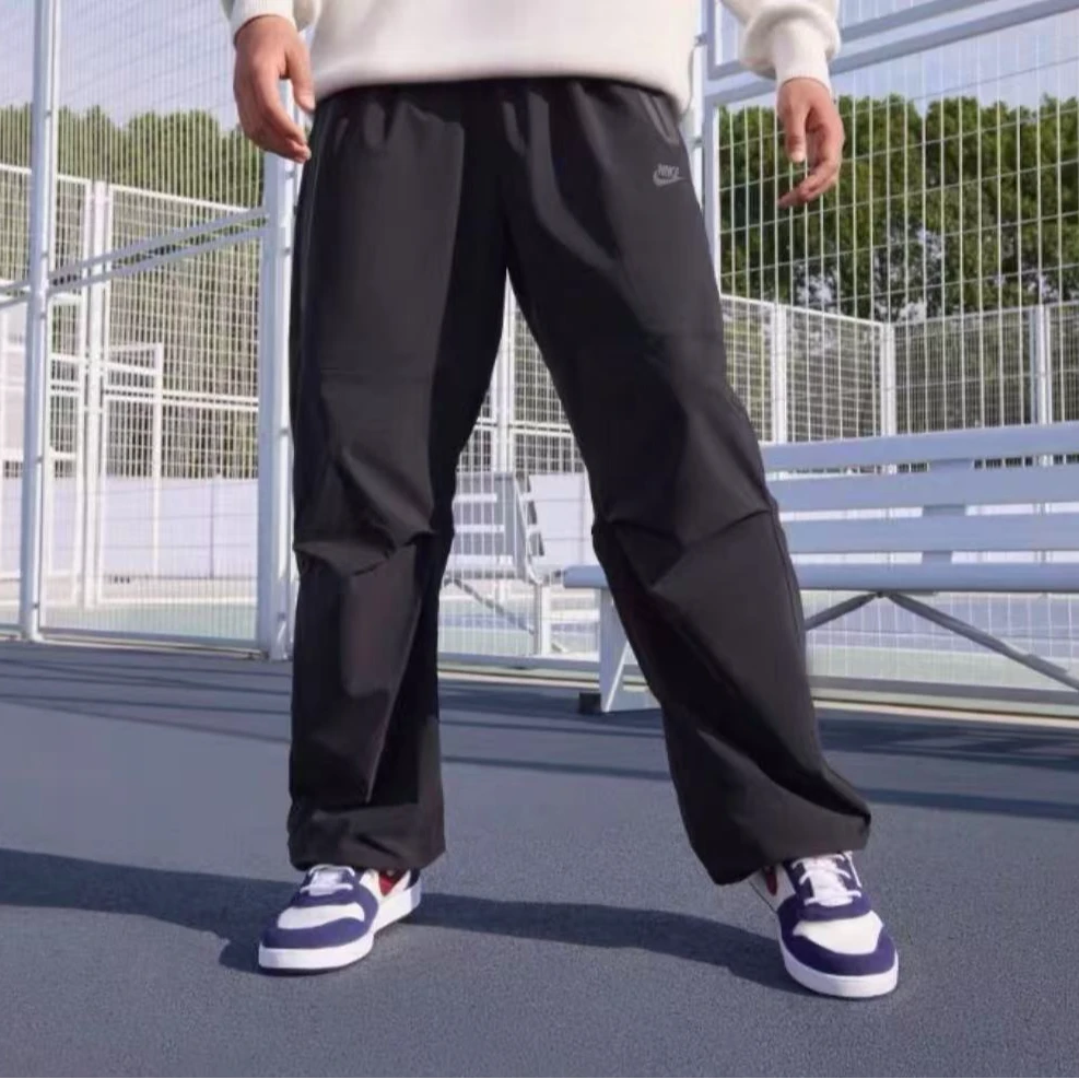 NIKE/耐克男裤新款梭织宽松工装裤休闲收口长裤HM7159010