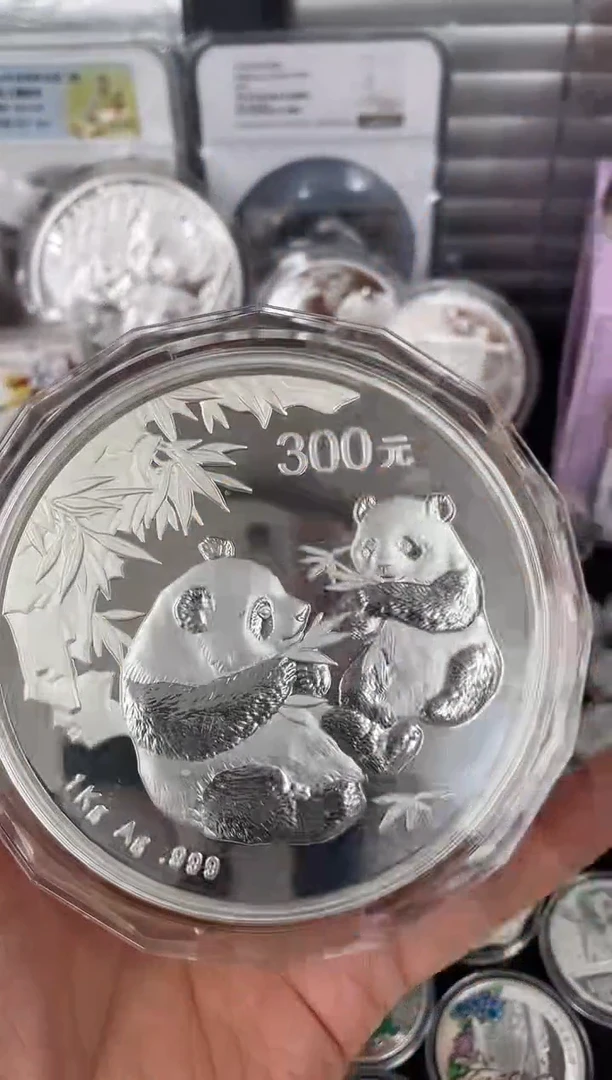 纯银2006公斤银猫1000克无证带盒