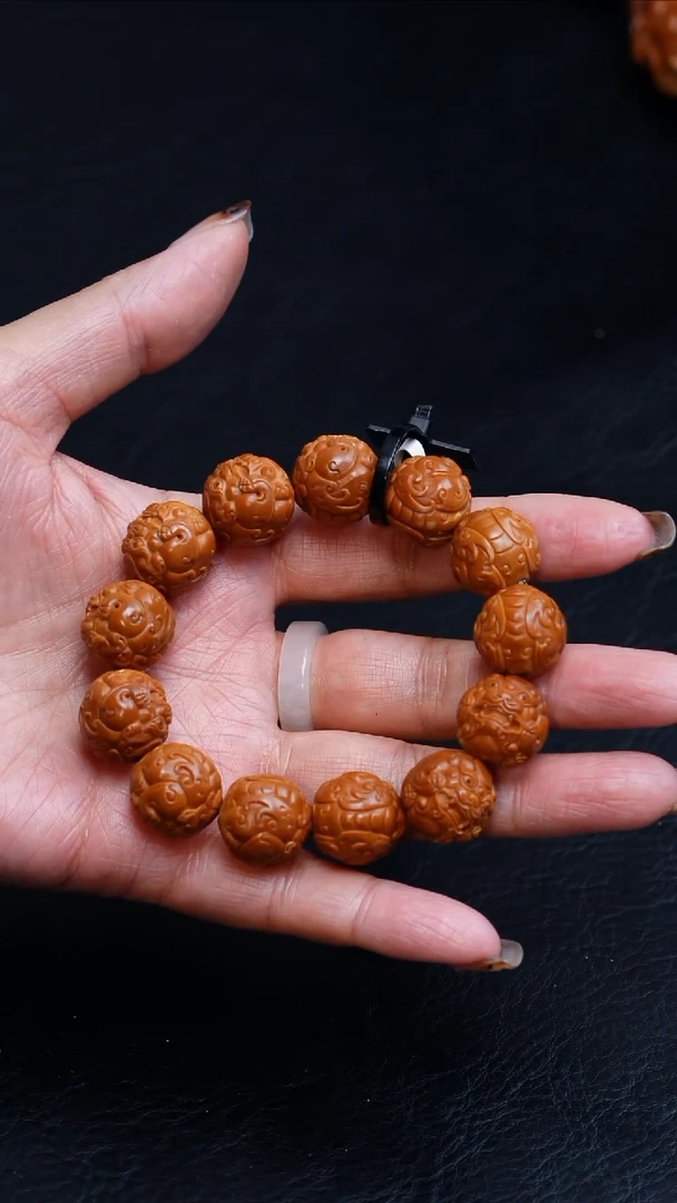 橄榄核吊坠16正圆唐狮手串