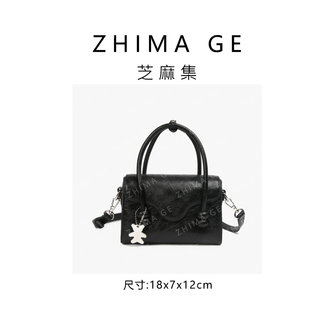 【芝麻集】SKL-7550-黑色RAIN.CUN潮流时尚百搭腋下斜跨女包
