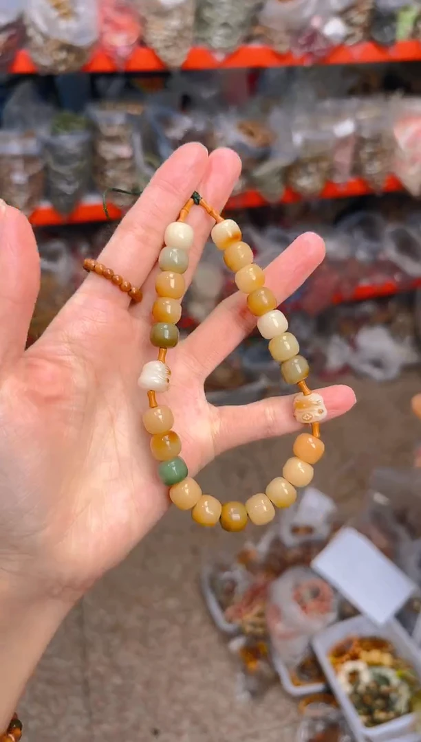 吊坠菩提根/象牙果竹节手机链一个