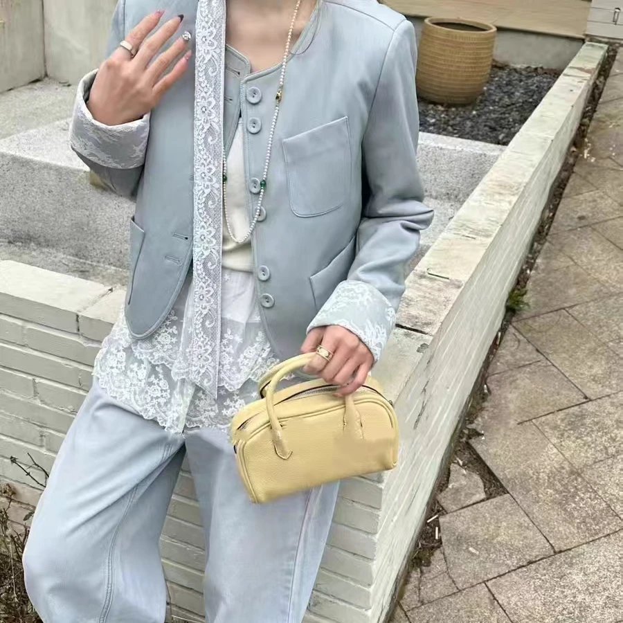 252202蕾丝飘带新款圆领设计感短款皮衣小外套简约气质女装上衣