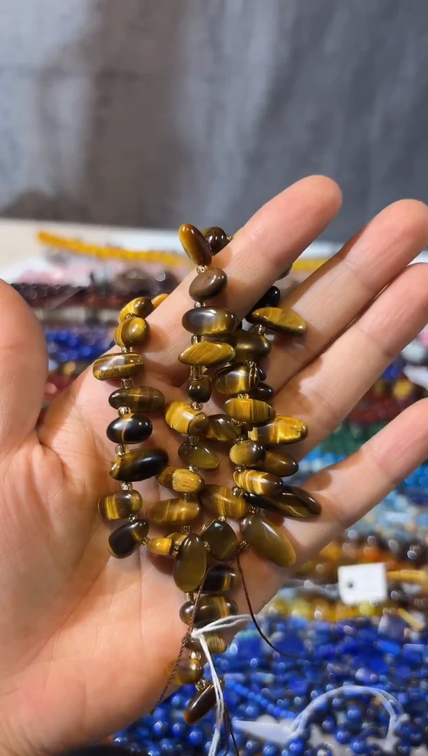 合金查罗石珠宝半成品虎眼长牙一条