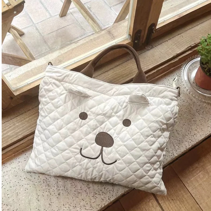 F173多功能妈咪包卡通手提包米色小狗