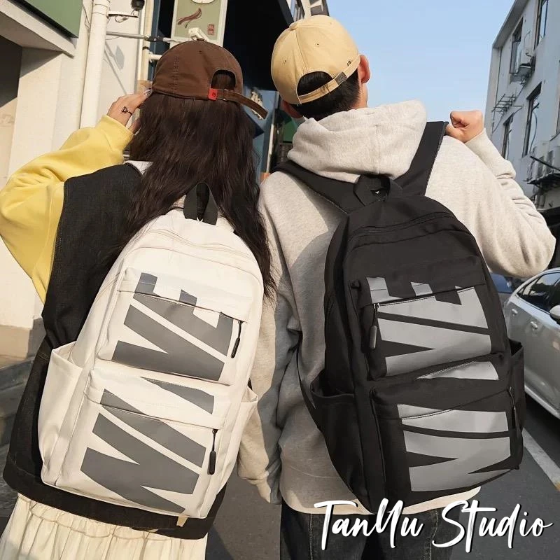 探屿小学生初中生高中学生书包男大容量高颜值大学生背包女双肩包