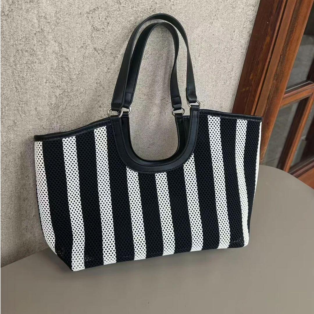 休闲大容量镂空网布包包女2025新款通勤单肩包夏季手提托特包条纹