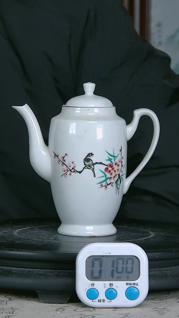 陶粉彩精绘花鸟图壶